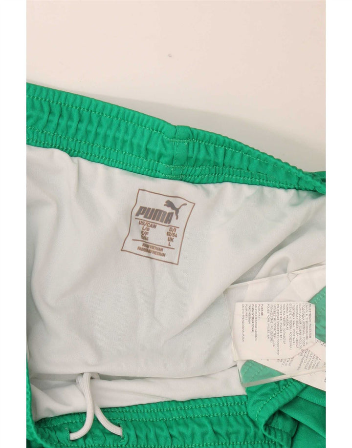Shorts esportivos masculinos Puma grande poliéster verde