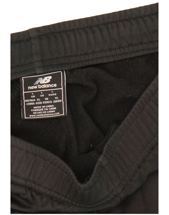 Calça de treino masculina New Balance grande preta