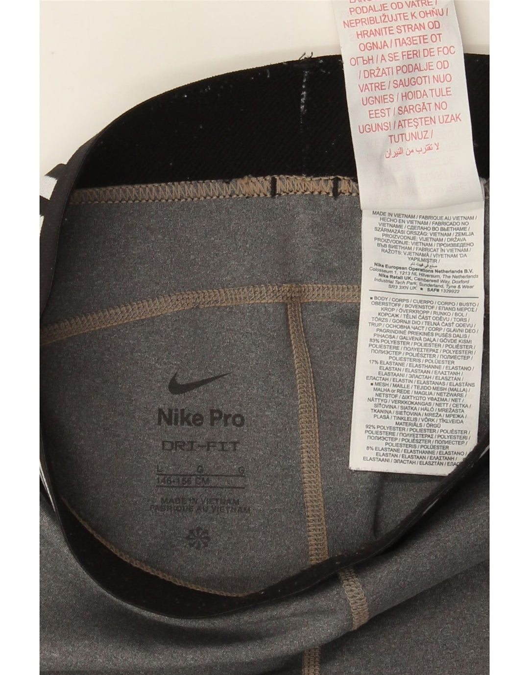 Leggings gráficas Nike para meninas 12-13 anos grandes cinza colorblock poliéster