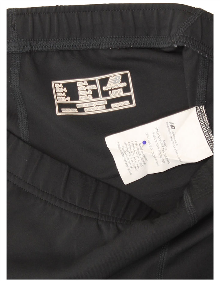 Leggings femininos New Balance UK 14 poliéster preto grande