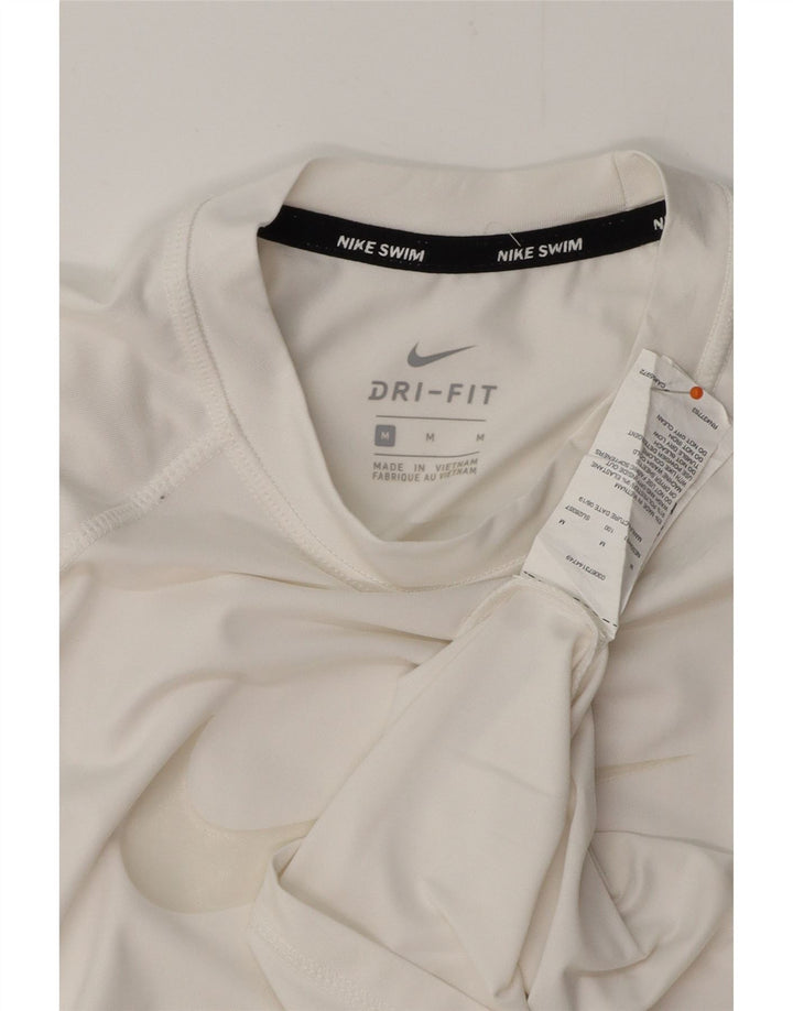 Camiseta feminina Nike Dri Fit Graphic UK 12 Médio Poliéster Branco