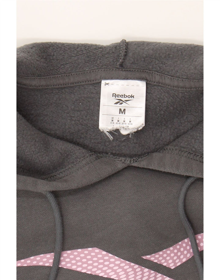 REEBOK Womens Graphic Hoodie Jumper UK 12/14 Medium Grey Cotton Vintage Reebok and Second-Hand Reebok from Messina Hembry 
