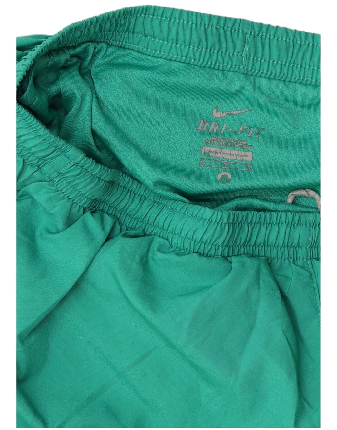 Shorts esportivos femininos Nike Dri Fit UK 12 verde médio