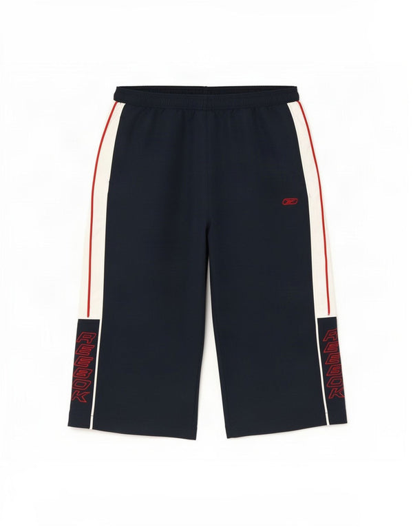 Calças corta-vento Reebok Boys Graphic 15-16 anos XL azul marinho