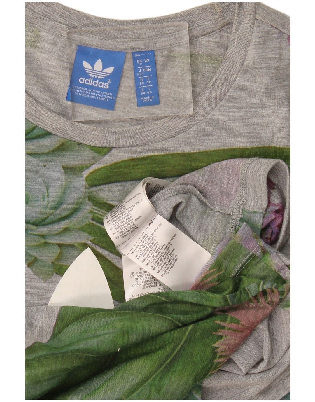 Camiseta feminina gráfica Adidas UK 12 poliéster floral cinza médio
