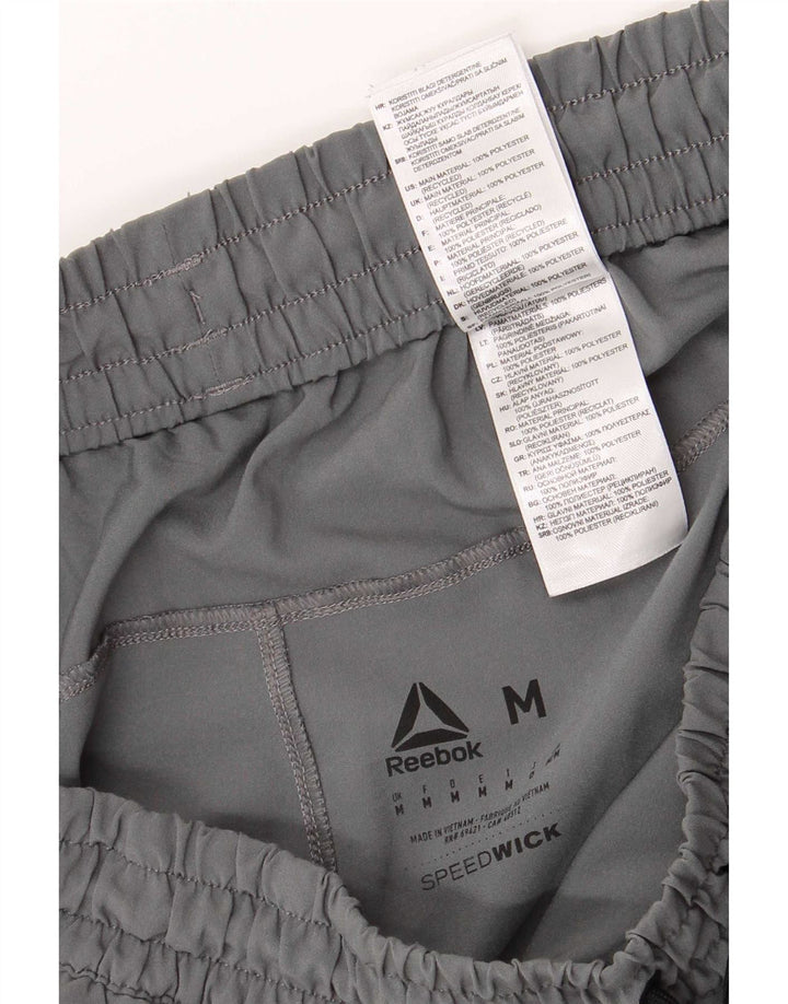 Shorts esportivos regulares masculinos Reebok médio cinza poliéster esportivo