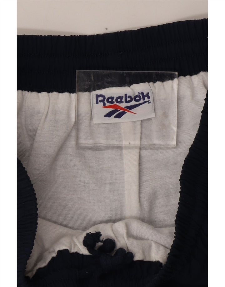 REEBOK Mens Tracksuit Trousers Joggers Large  Navy Blue Polyamide Vintage Reebok and Second-Hand Reebok from Messina Hembry 