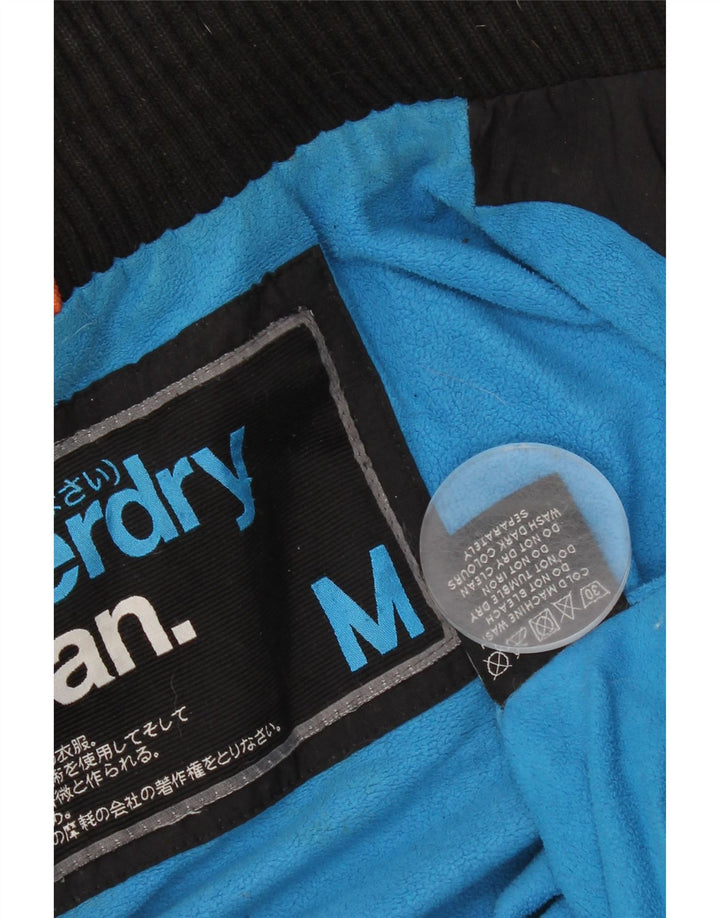 Jaqueta corta-vento masculina Superdry com capuz gráfico Reino Unido 38 médio preto nylon