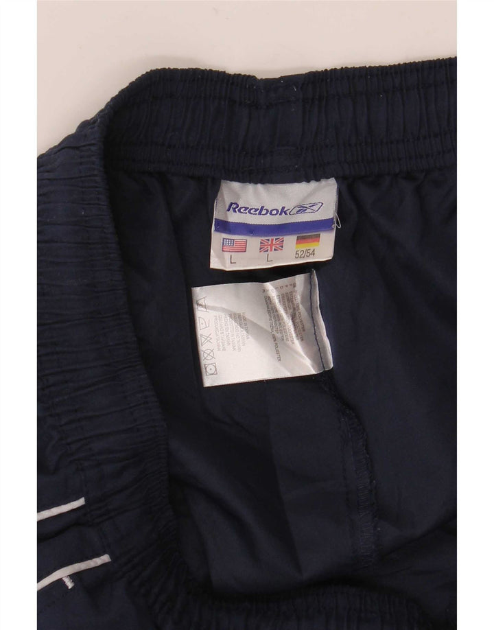 Calça de treino masculina Reebok Graphic grande poliéster azul marinho