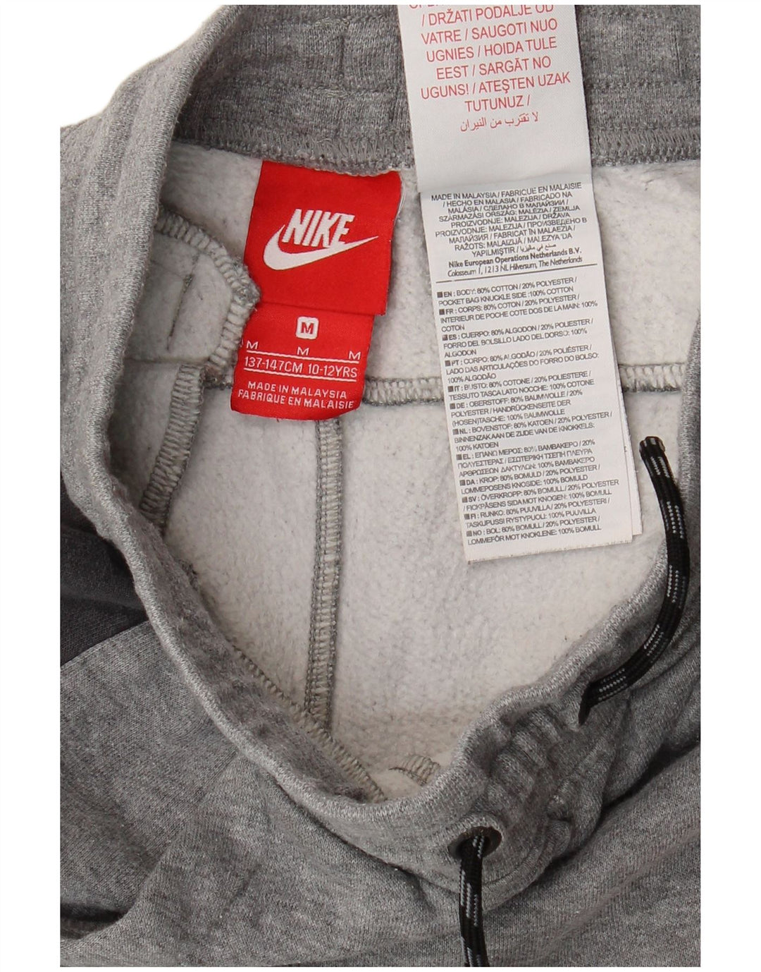 Calça de treino Nike Boys Joggers 10-11 anos cinza médio algodão