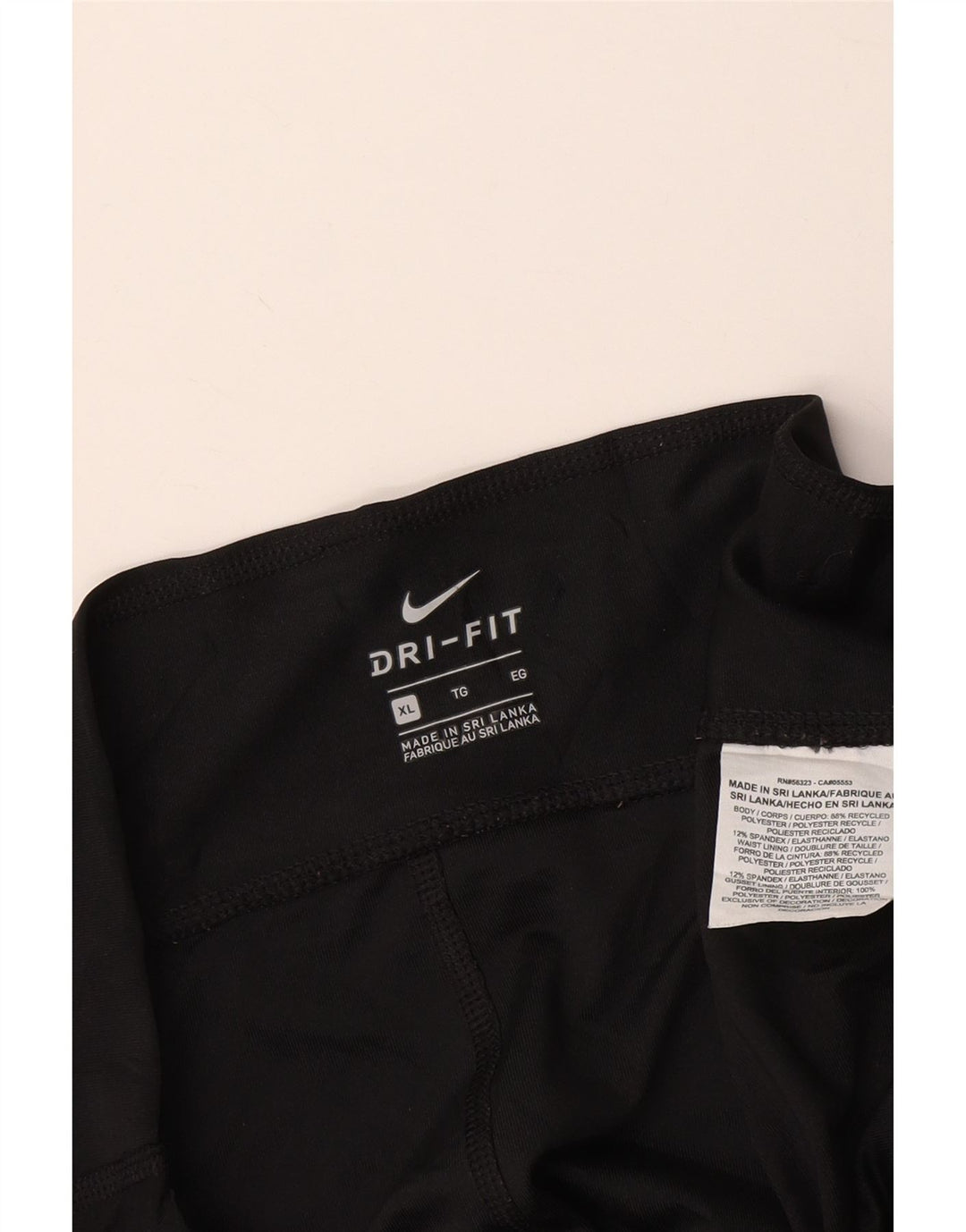 Calça legging feminina Nike Dri Fit Graphic Capri UK 18 XL preta poliéster