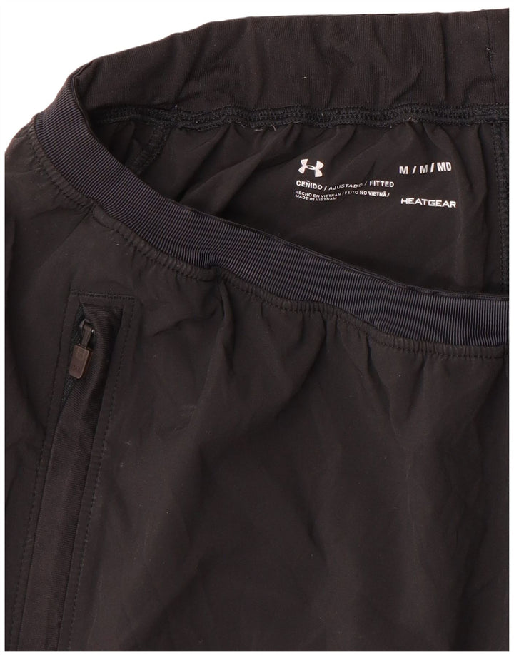 Calça de treino feminina Under Armour Heat Gear médio preto