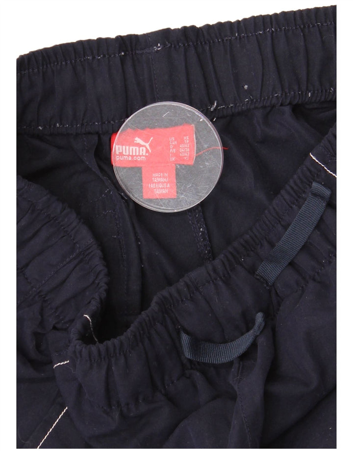 Shorts esportivos gráficos masculinos PUMA XS azul marinho colorblock