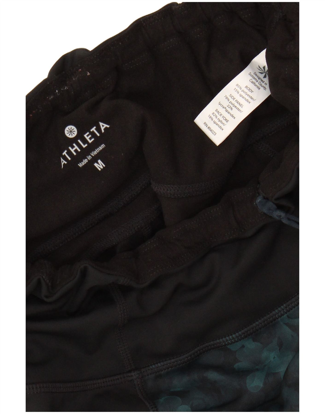 Leggings femininos ATHLETA UK 12 poliéster floral preto médio