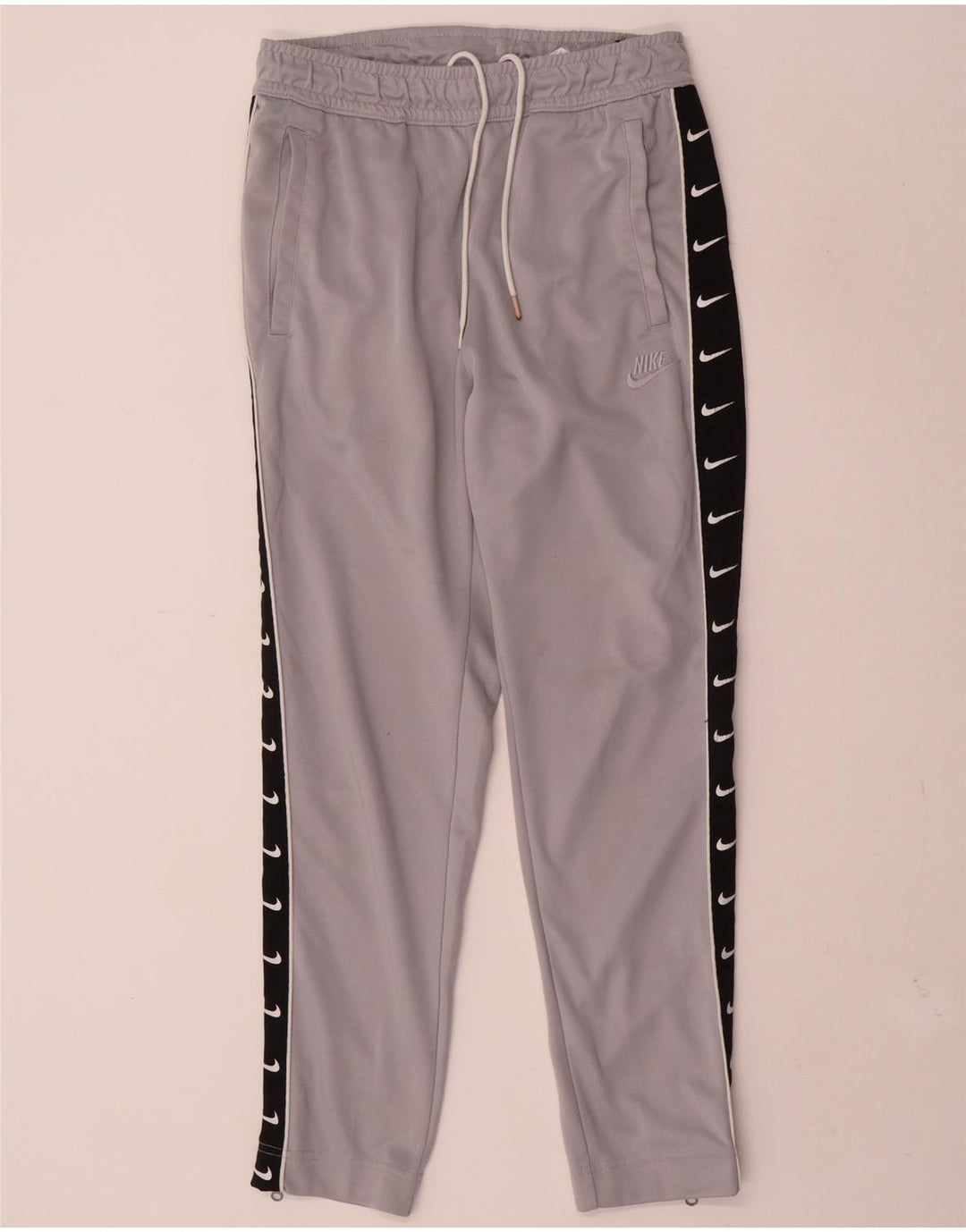 Calça esportiva Nike masculina gráfica pequena cinza colorblock poliéster