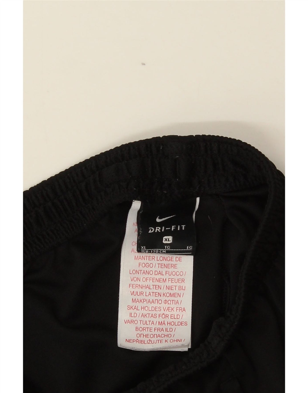 Calça de treino Nike Boys 13-14 anos XL preto colorblock poliéster