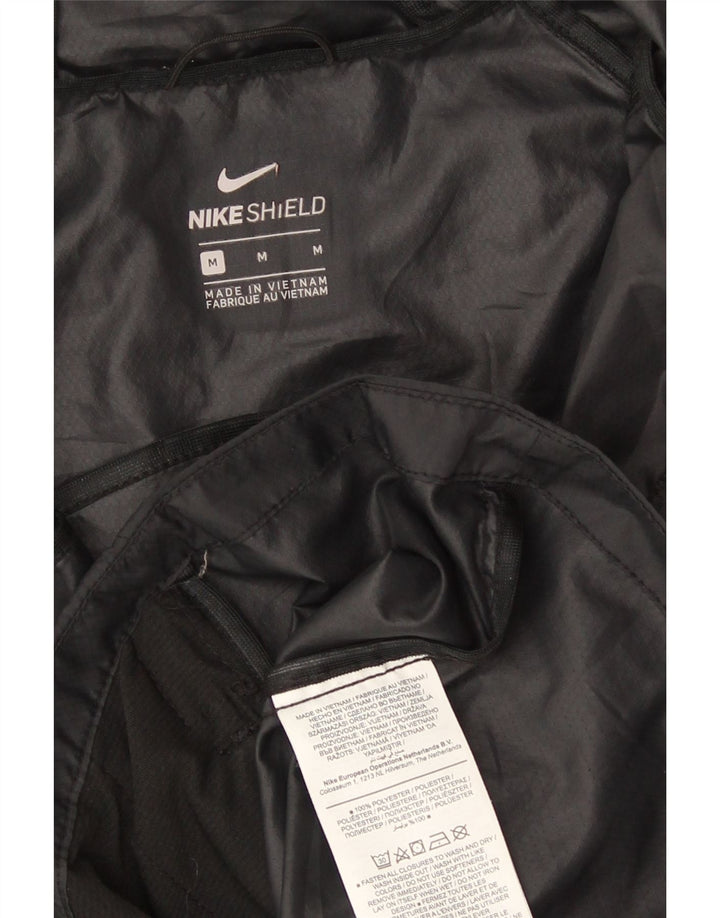 Jaqueta de chuva feminina com capuz Nike UK 14 médio preto poliéster esportivo