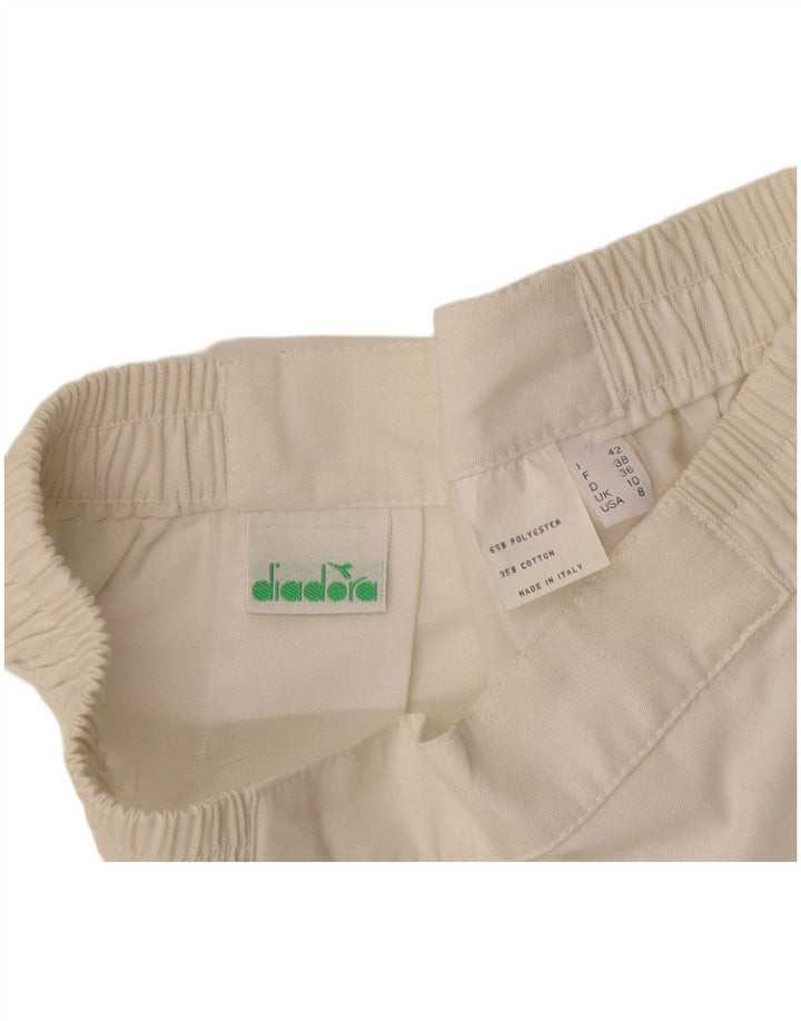 Saia de tênis feminino Diadora UK 10 pequeno poliéster branco