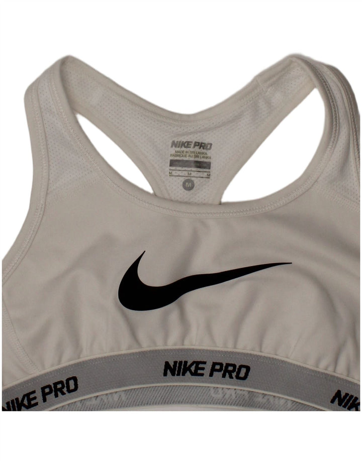 Sutiã esportivo Nike feminino Dri Fit gráfico top médio branco poliéster esportivo