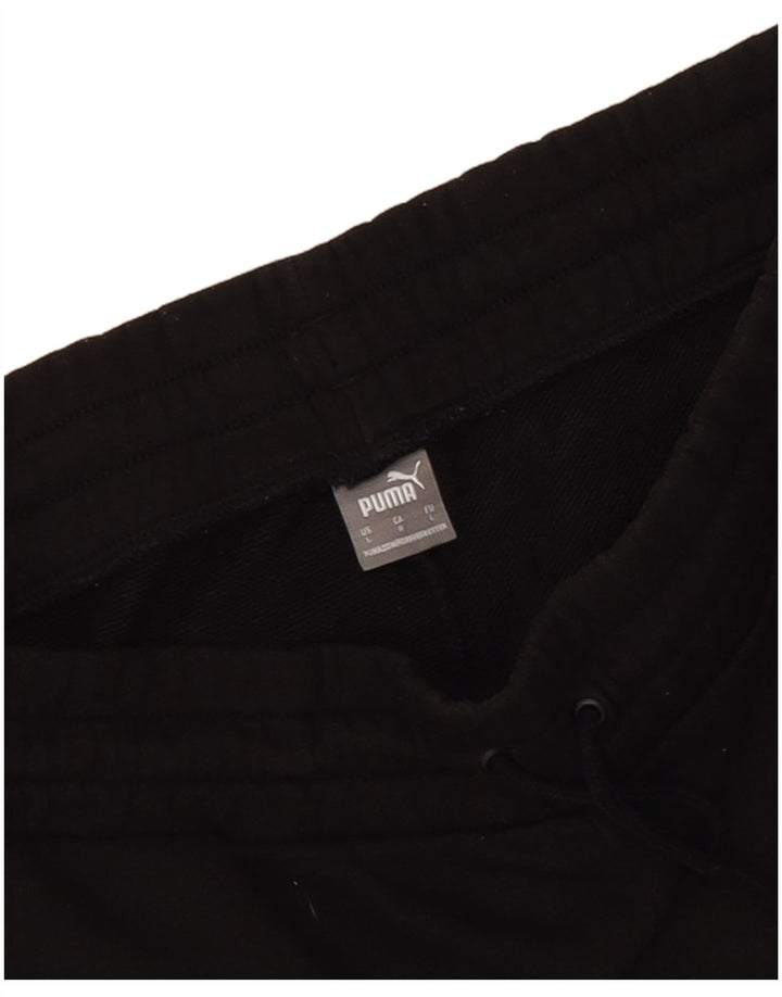 Shorts esportivos femininos Puma UK 14 grandes pretos