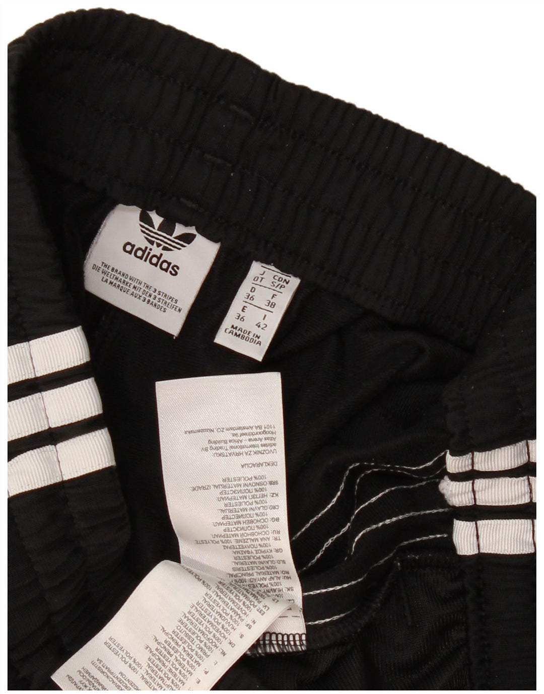 Shorts esportivos femininos Adidas UK 10 pequenos esportivos pretos de poliéster