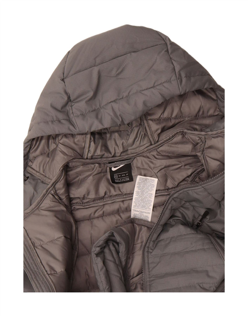 NIKE Womens Graphic Hooded Padded Jacket UK 6 XS Grey Cotton Vintage Nike and Second-Hand Nike from Messina Hembry 