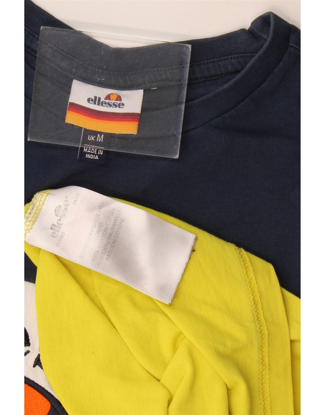 Camiseta masculina Ellesse com estampa gráfica em algodão colorblock amarelo médio