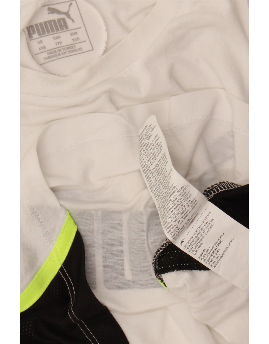 Camiseta feminina PUMA Crop Oversized Graphic UK 2 2XS Branco Colourblock