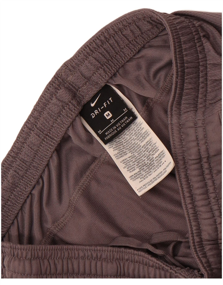Calça de treino masculina Nike Dri Fit cinza médio colorblock poliéster
