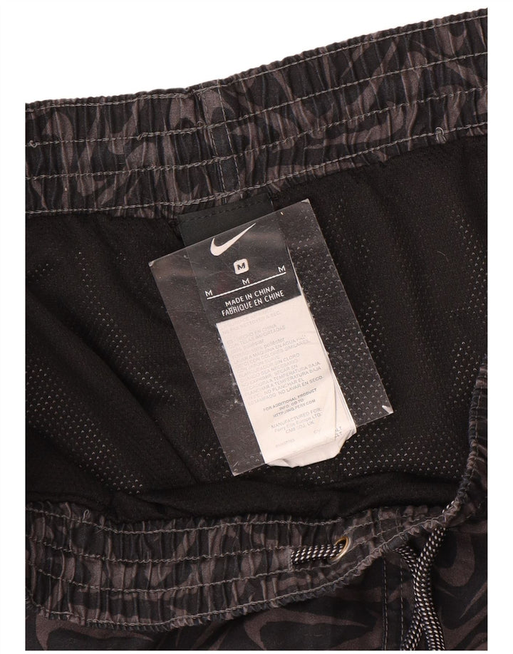Shorts esportivos gráficos masculinos Nike médio preto poliéster