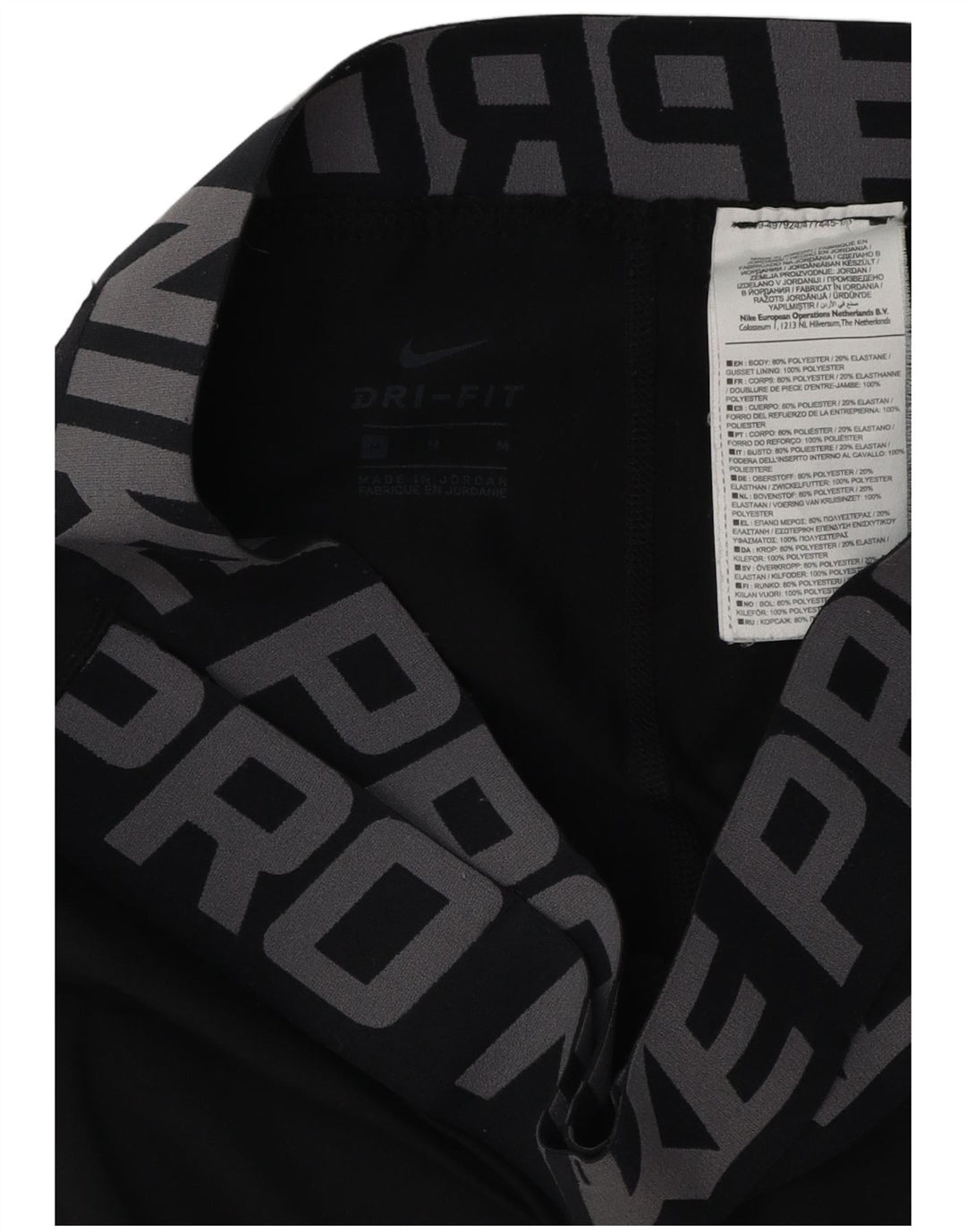Leggings femininas Nike Dri Fit Graphic UK 12 médio preto poliéster
