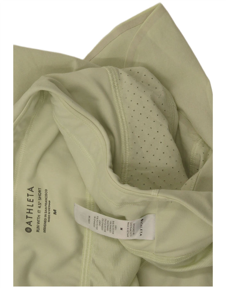 Shorts esportivos femininos Athleta UK 14 poliéster verde médio