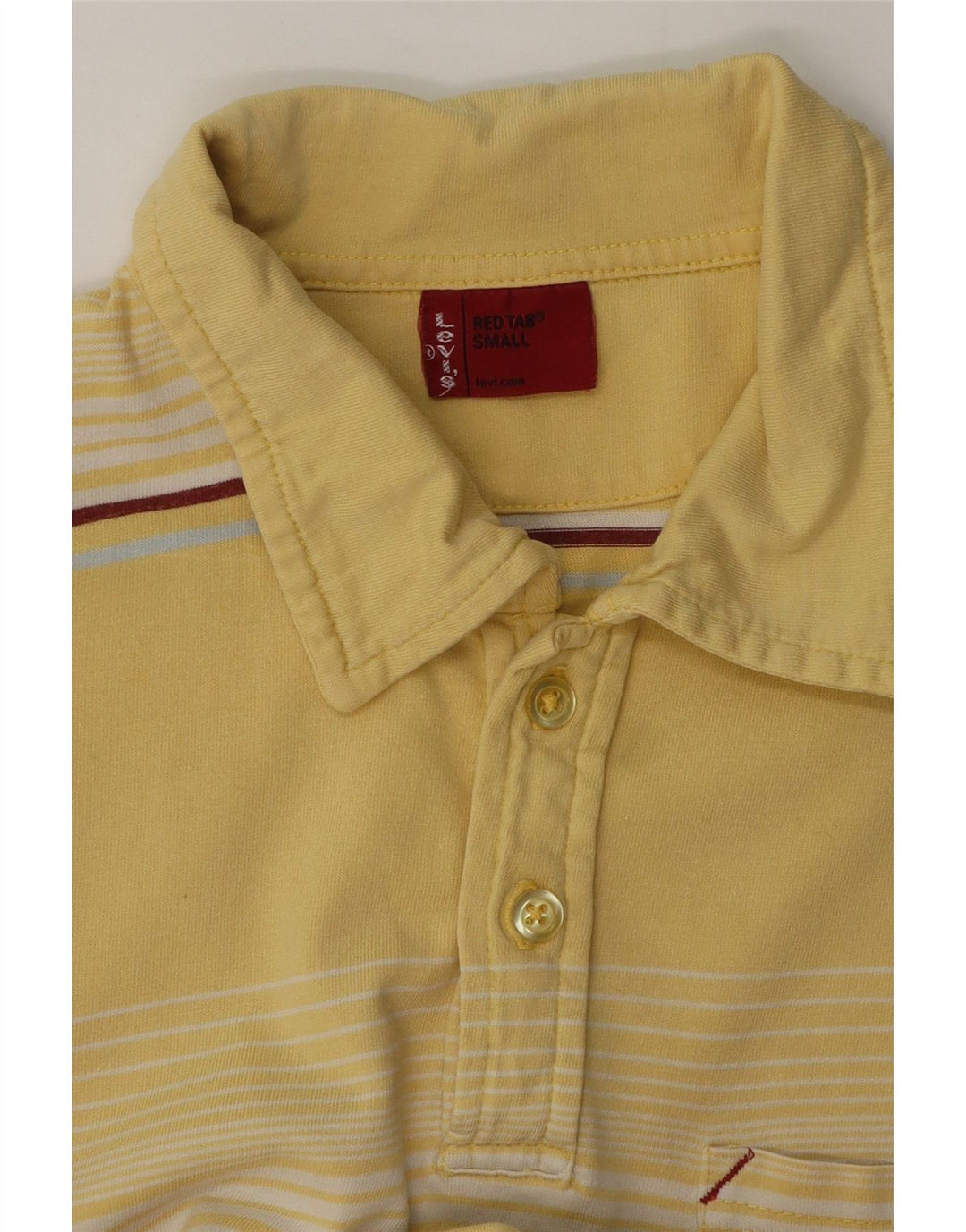 Camisa pólo gráfica masculina Levi's pequena listrada amarela