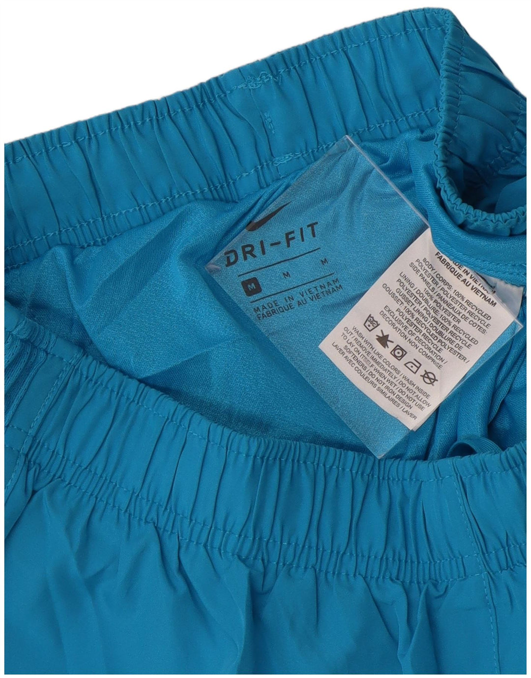 Shorts esportivos femininos NIKE Dri Fit UK 14 médio azul poliéster