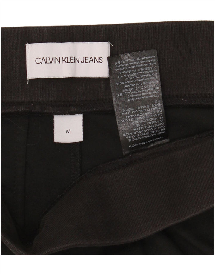 Calça cropped masculina Calvin Klein com estampa gráfica média W32 L25 poliéster preto