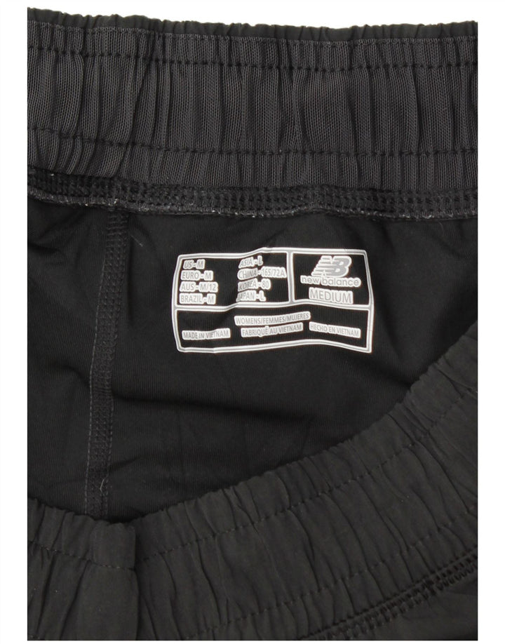 Shorts esportivos femininos New Balance UK 14 médio preto