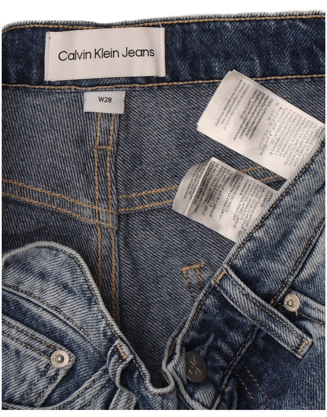 Calça jeans feminina Calvin Klein desgastada W28 algodão azul médio