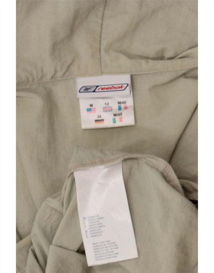 Jaqueta de chuva com capuz feminino Reebok UK 12 médio bege nylon
