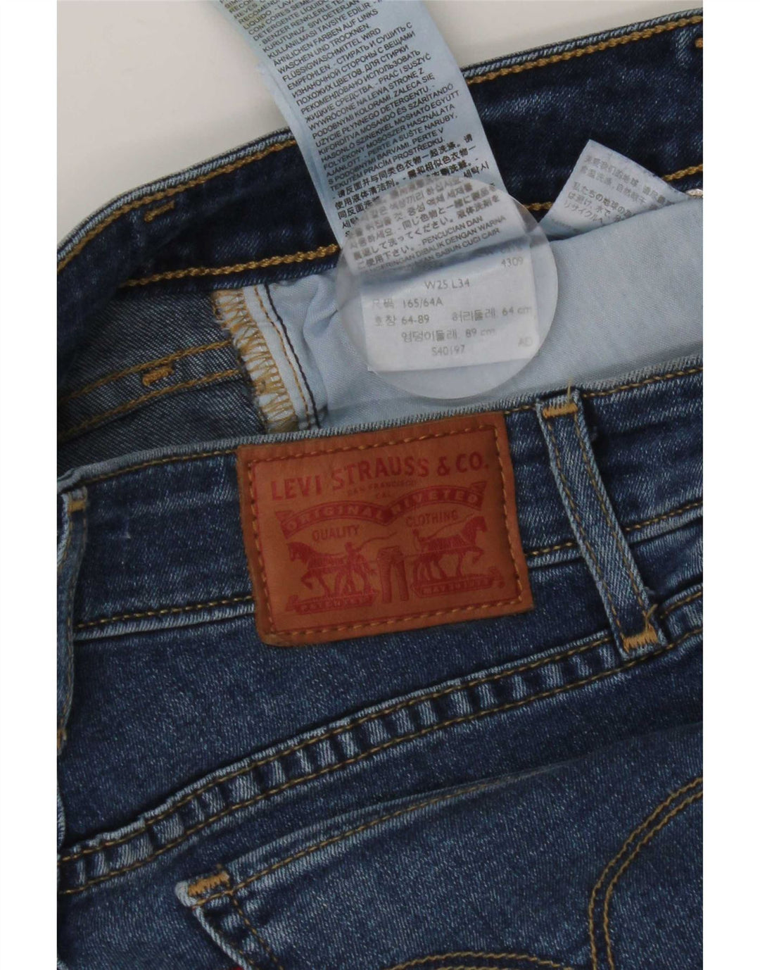 Calça jeans feminina Levi's 714 Straight W25 L34 azul algodão