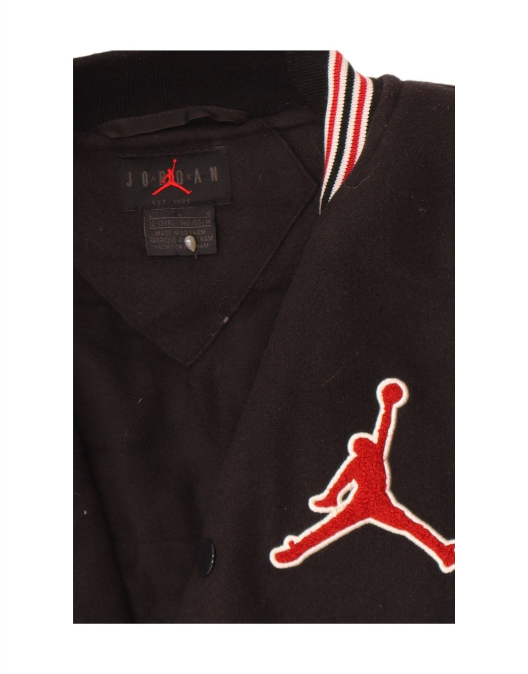 Jaqueta Jordan Boys Graphic Varsity 12-13 anos grande bloco colorido preto