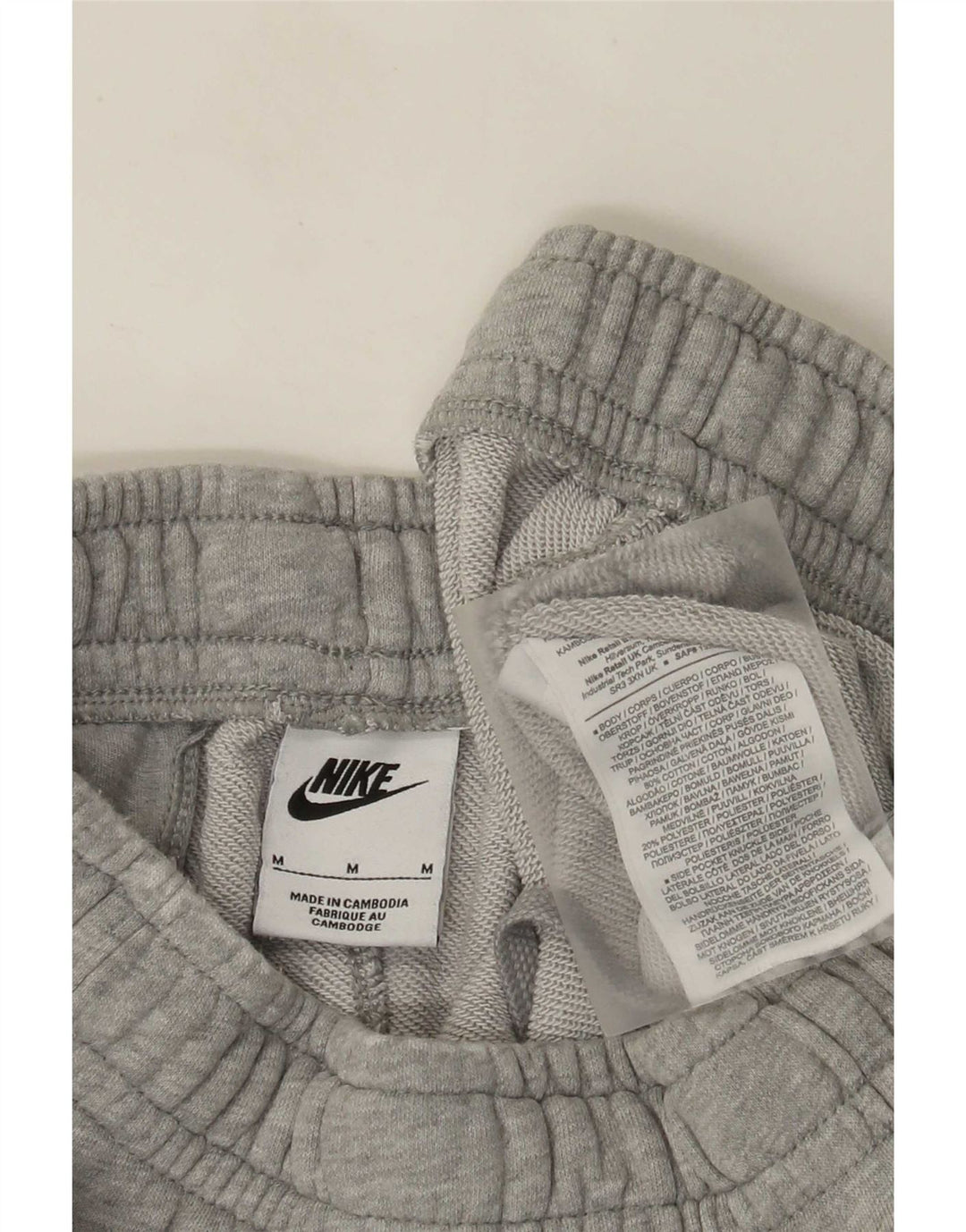 Calça de treino masculina Nike Joggers cinza médio algodão manchado