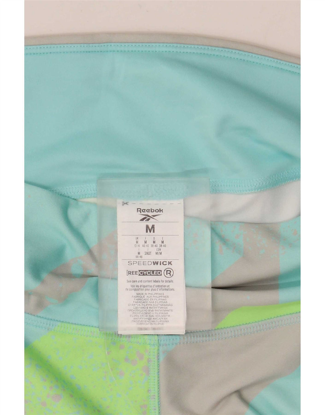 Leggings Capri Mulher Reebok UK 12/14 Poliéster Geométrico Turquesa Médio