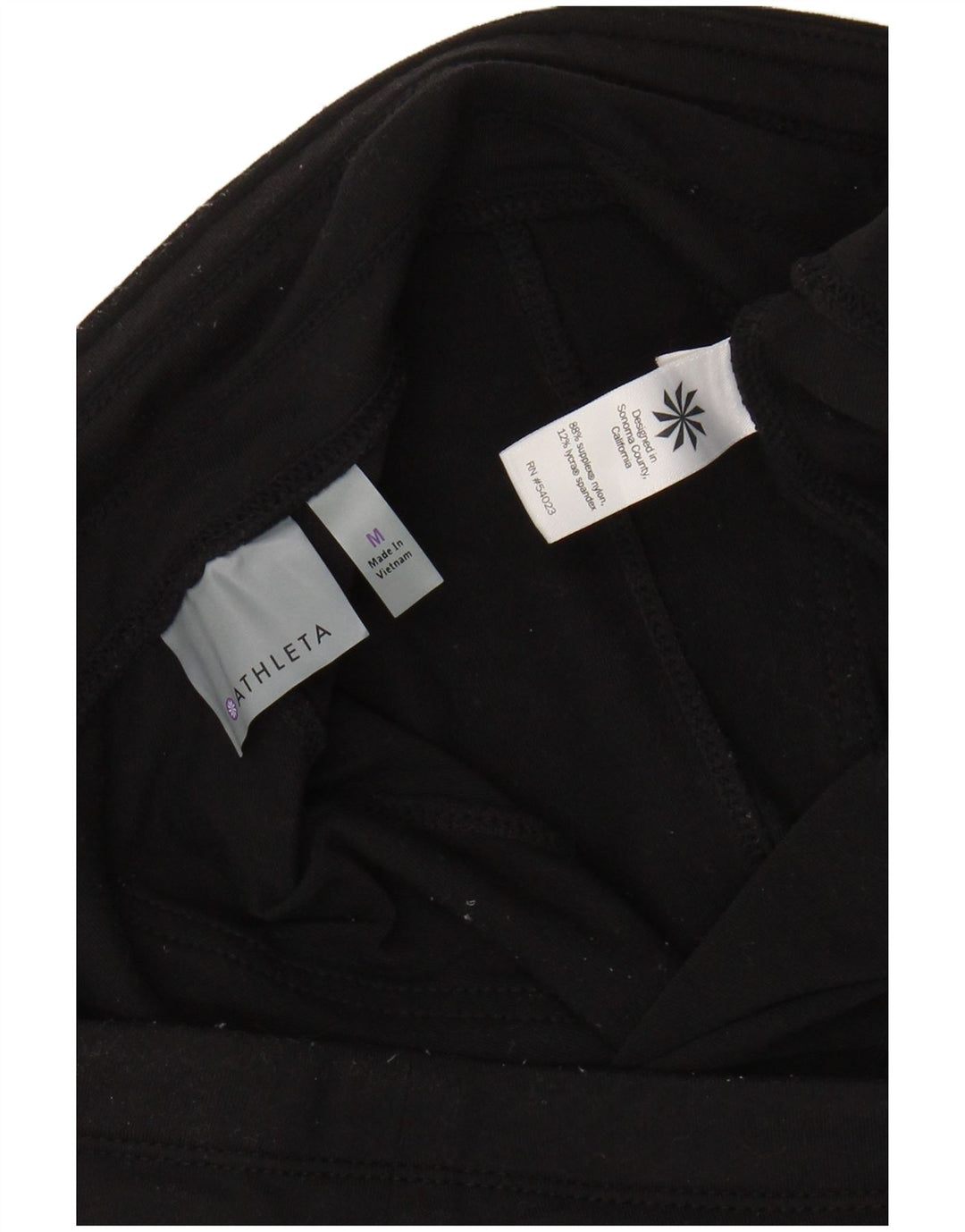 Calça de treino feminina ATHLETA UK 14 médio preto nylon