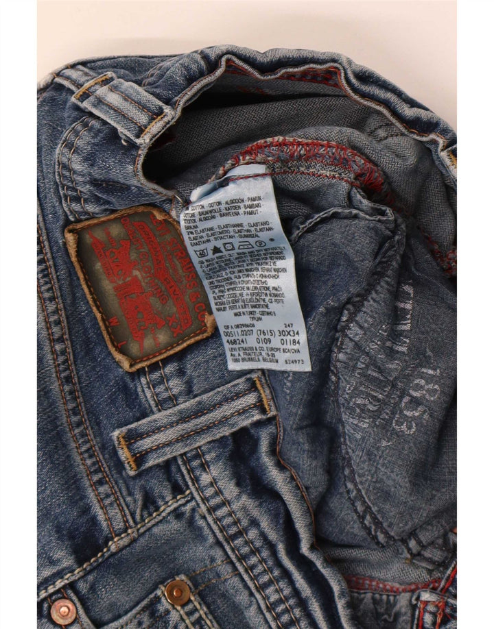 Calça jeans feminina Levi's 511 Distressed Slim W30 L29 azul algodão