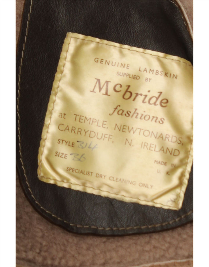 Jaqueta feminina vintage de shearling de grandes dimensões IT 36 XS pele de cordeiro marrom