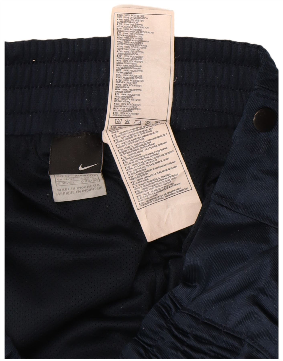 Calça de treino masculina Nike médio azul marinho colorblock poliéster