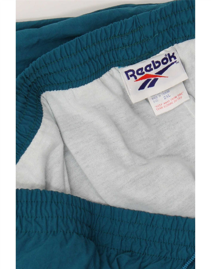 Calça de treino masculina Reebok Joggers 2XL azul nylon