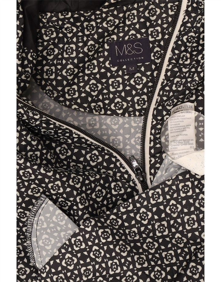 Capa de chuva feminina com capuz Marks & Spencer Reino Unido 14 médio preto geométrico