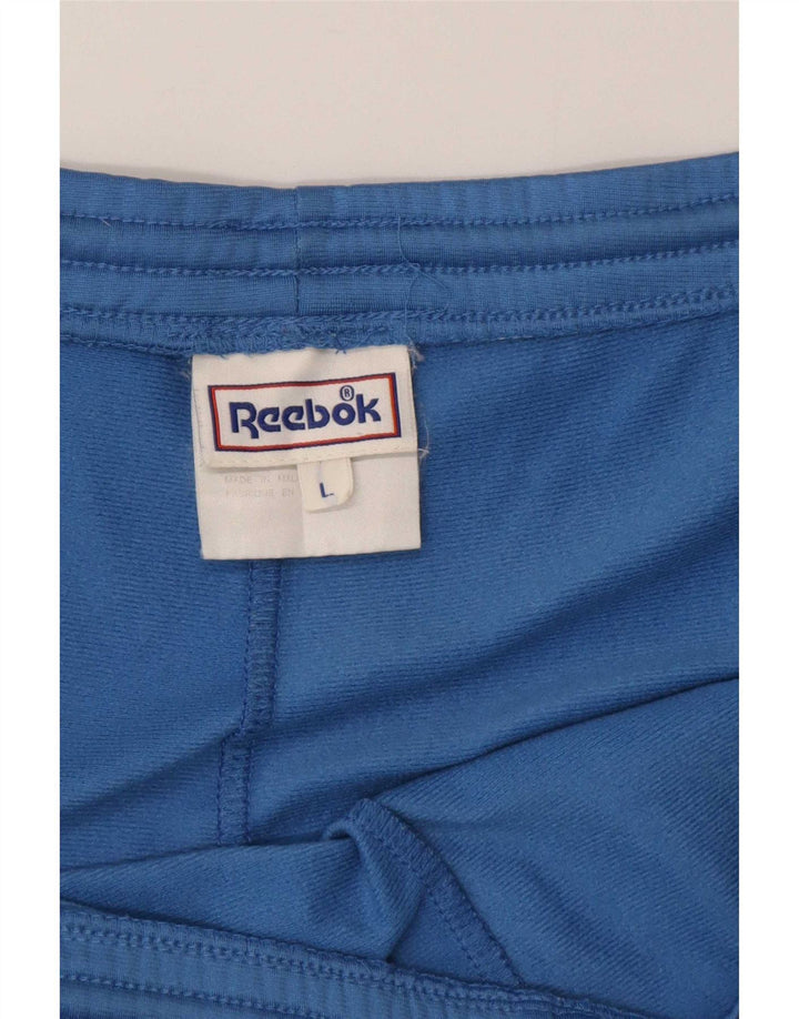 Calça de treino masculina Reebok grande azul colorblock poliéster