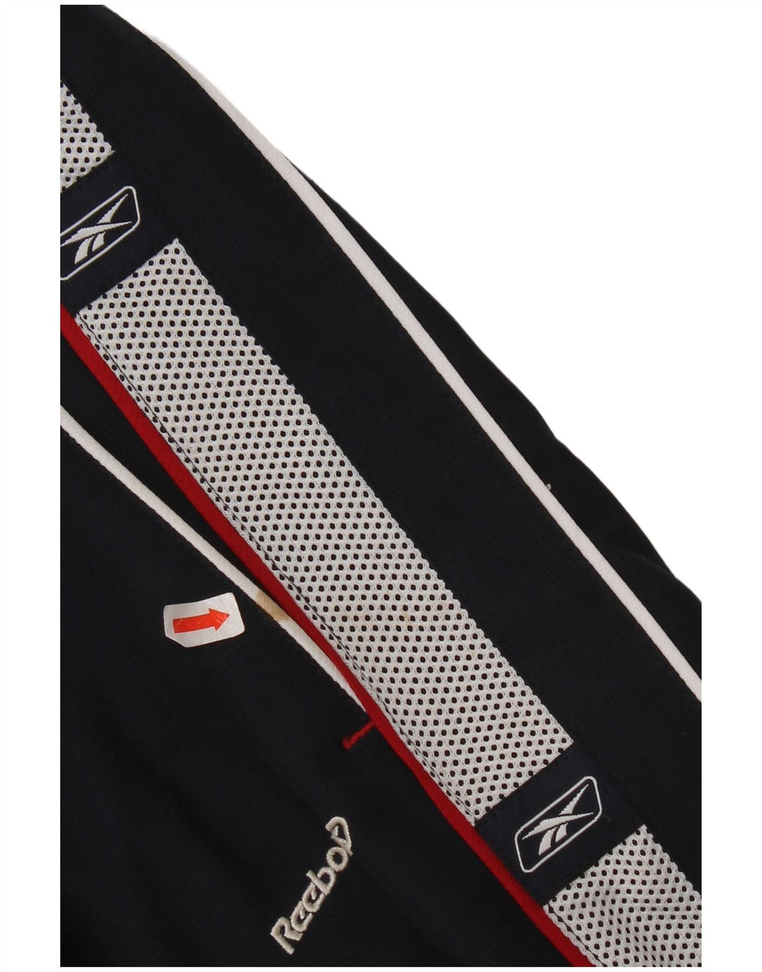 Calças de treino gráfico Reebok Boys 14-15 anos XL azul marinho Colourblock